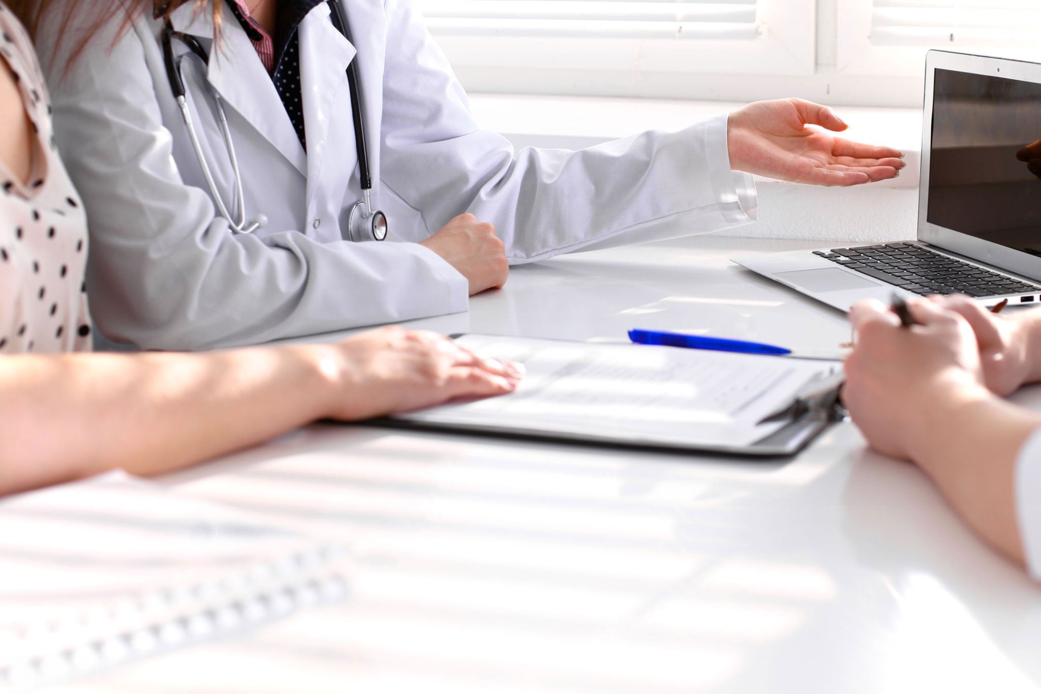 A medical team examining data